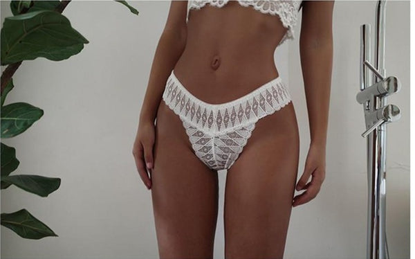 HLS See Through Lace T-Back Thongs.